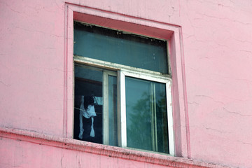 Pyongyang. North Korea. Open window in dwelling house