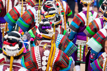 Miao girls dancing at festival near Kaili, Guizhou Province, China