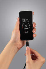 Elegant hand charging cellphone with low battery