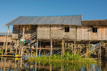 Fototapeta na wymiar Myanmar. Shan State. Inle Lake. Traditional floating houses on Inle Lake.