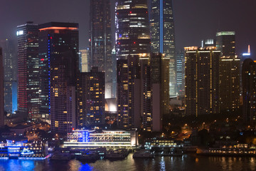 Fototapeta na wymiar Night view of high-rise by Huangpu River, Pudong, Shanghai, China