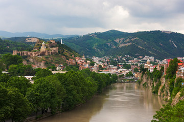Mt'k'vari (Kura) River flowing through Tbilisi, Georgia.