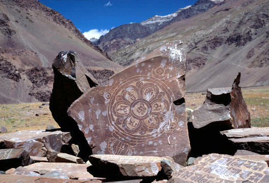 Asia, India, Ladakh, Karsha. Carved and decorated mani stones lie upended in Karsha Gompa, Zanskar Valley, India.