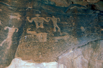 Asia, Jordan, Wadi Rum. Ancient Rock depicting hunting scene.