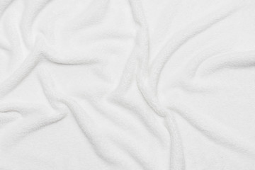 White crumpled blanket, texture, top view