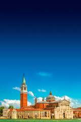 Beautiful Church of San Giorgio Maggiore and its Bell Tower at sunset illumination, Venice, Italy, summer