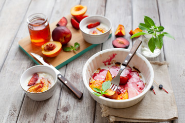  Healthy sweet summer dessert with yogurt plum and peach