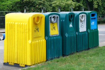 Separate garbage collection. Waste recycling concept. Containers for metal, glass, paper, plastic...