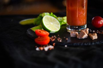 bloody mary cocktail with fresh tomatoes juice, salt & pepper