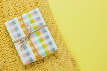 colorful gift box isolated on yellow background,space for copy and text,holiday gift box