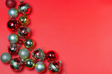 Christmas ornaments decorations background. Classic red glass balls with glitter.