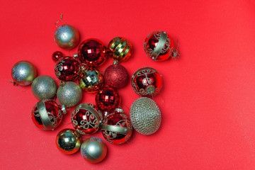 Christmas ornaments decorations background. Classic red glass balls with glitter.