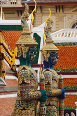 One of six pairs of guardian demons flanking entrance to the Gallery or Phra Rabieng, Wat Phra Kaeo, Bangkok, Thailand