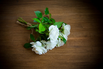 bouquet of beautiful white roses on table