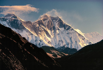 Asia, Nepal, Sagarmatha NP. Fierce winds whip snow off Mt. Everest, on the left, and Lhotse and Nuptse in Sagarmatha National Park, a World Heritage Site, in Nepal.