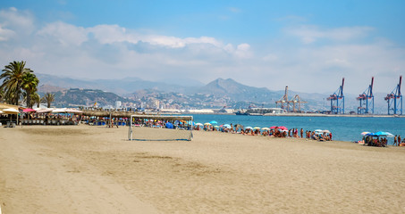 Obraz premium people at the beach on the shore of the Mediterranean Sea