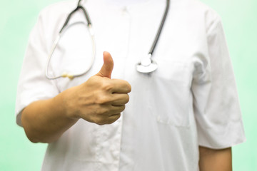 Close-up of a doctor showing a positive approving gesture.