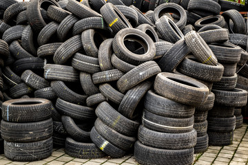 Used tire stacks in Workshop vulcanization yard