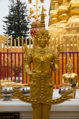 Thailand, Chiang Mai Province, Wat Phra That Doi Suthep. Gold Buddha statue.