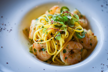 fresh italian pasta with garlic, pepperoni, olive oil & grilled shrimps