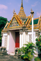 Asia, Thailand, Bangkok. Grand Palace, temple gate with elephant statues.
