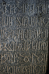 Armenia, Haghpat, view of an old armenian script with old armenian letters, carved on a block of stone