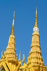 Cambodia, Phnom Penh. Spires at temple at Royal Palace.
