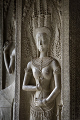 Cambodia, Angkor Wat. Apsara (female cloud spirit) carving.