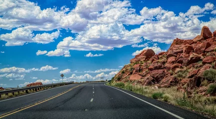 Badkamer foto achterwand Arid landscape of Arizona. The crumbling sandstone mountains and the highway © konoplizkaya