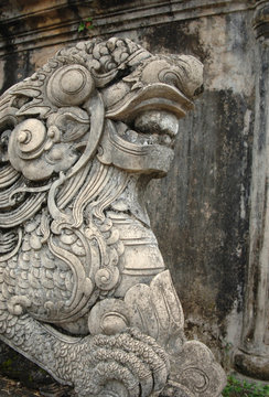 Asia, Vietnam. Lion guarding the entrance at the Citadel, Hue, Thua Thien–Hue