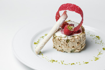 author's creamy dessert with raspberries and pistachios