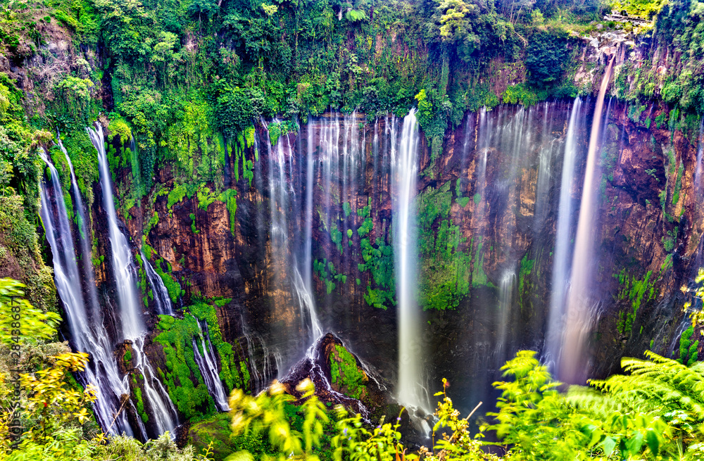 Sticker tumpak sewu waterfalls in east java, indonesia