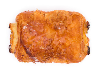 Chocolate croissant isolated on white, top view