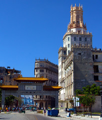 Fototapeta premium Havana, Cuba, Chinese arch entrance to Cuban China Town or Barrio Chino in center of Havana with people in the distance