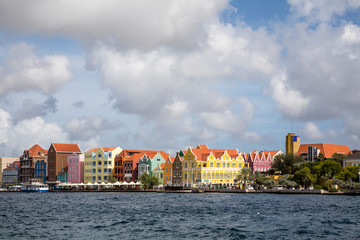 Lesser Antilles, Curacao, Willemstad. Colorful shopping district along the water