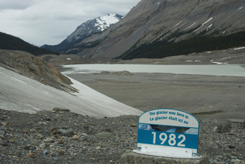 Canada: Alberta, Columbia Icefields, Athabasca Glacier, signs marking dates of former edge of...