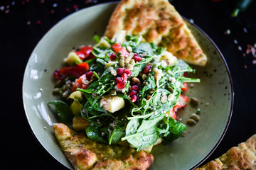 fresh quinoa salad with mix of vegetables & focaccia bread