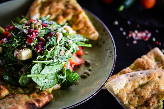 fresh quinoa salad with mix of vegetables & focaccia bread