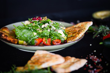fresh quinoa salad with mix of vegetables & focaccia bread