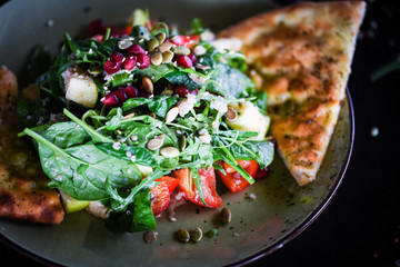 fresh quinoa salad with mix of vegetables & focaccia bread