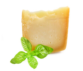 piece of cheese or Italian cheese with fresh green basil isolated on white background with clipping path.
