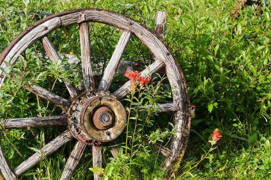 Old wagon wheel in historic old gold town Barkersville, British Columbia, Canada.