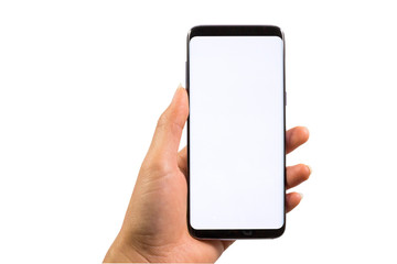 Hand holding the modern smartphone with blank screen and modern frameless design - isolated on white background with clipping path.