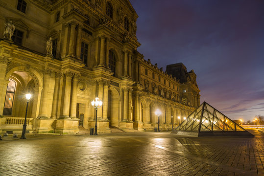 View of famous Louvre Museum with Louvre Pyramid