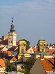 Fototapeta na wymiar Czech Republic, South Moravia, Mikulov. The church Tower and steeple of St Wenceslas in the town of Mikulov