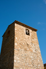 Fototapeta na wymiar France, Provence, Bormes-les-Mimosas. Historic stone bell tower..