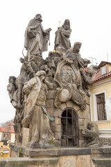 Obraz premium Czech Republic, Prague. Statues of three saints on Charles Bridge.