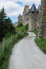 Fototapeta na wymiar France, Languedoc-Roussillon, ancient fortified city of Carcassonne, UNESCO World Heritage Site. Chateau de Carcassonne. City walls and gates.