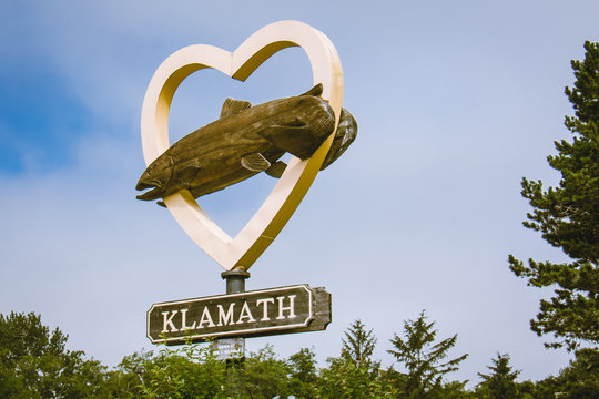 JULY 11 2019 - KLAMATH, CALIFORNIA: Welcome sign for Klamath California, shows a heart with a fish. The small town of Klamath is on an Indian Reservation in Redwood National Park