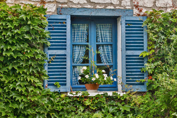 Fototapeta na wymiar Windows in small French village, Giverny, France.